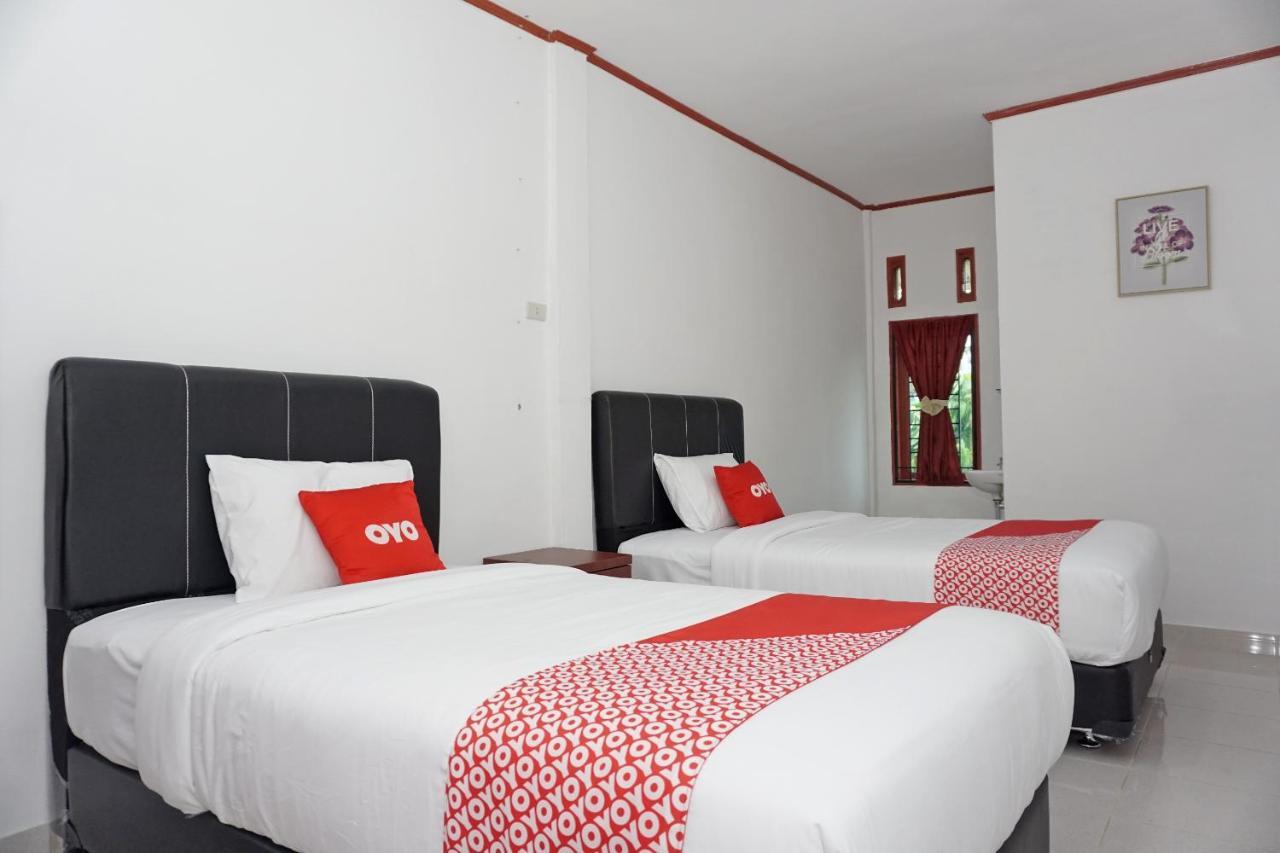 Oyo 2635 Ramos Inn Sinapuran ภายนอก รูปภาพ
