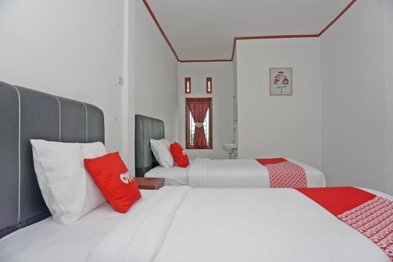 Oyo 2635 Ramos Inn Sinapuran ภายนอก รูปภาพ