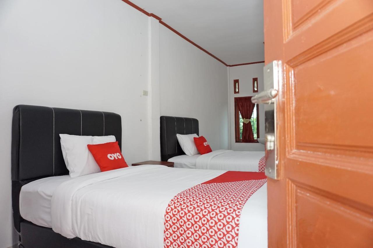Oyo 2635 Ramos Inn Sinapuran ภายนอก รูปภาพ