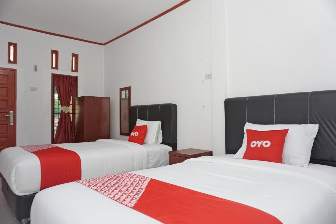 Oyo 2635 Ramos Inn Sinapuran ภายนอก รูปภาพ