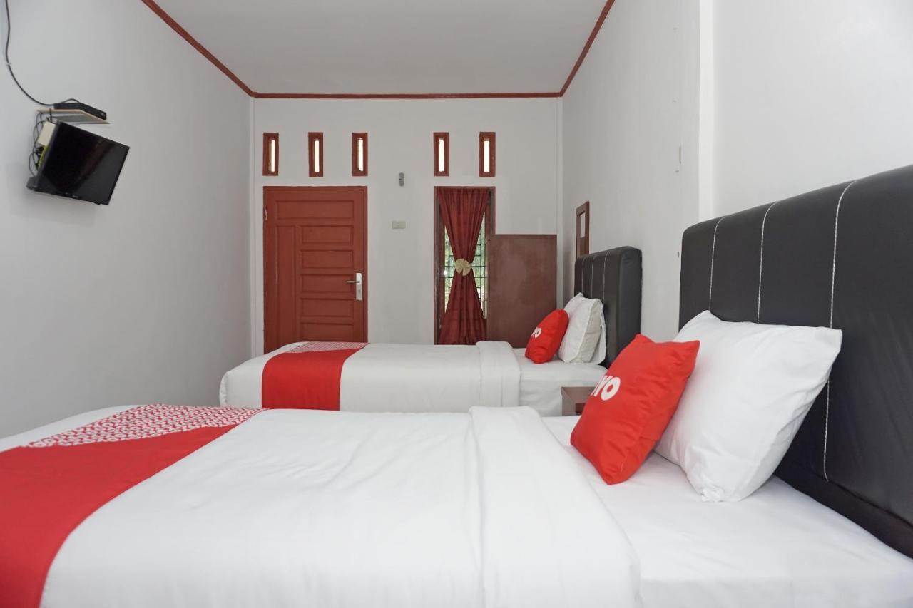 Oyo 2635 Ramos Inn Sinapuran ภายนอก รูปภาพ